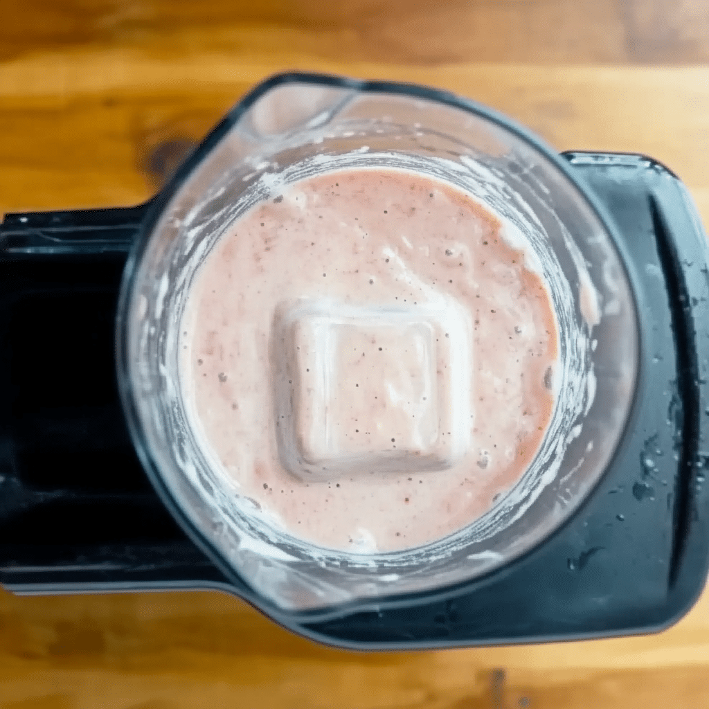 Bahama Mama Tropical Smoothie Cafe Recipe – Make This Fan Favorite at Home bahama mama tropical smoothie cafe recipe Blended Bahama Mama smoothie in glass blender