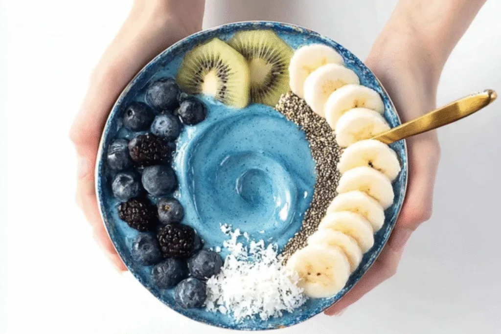 Blue Smoothie Bowl: A Sweet, Healthy Ocean in a Bowl Blue Smoothie Bowl Served blue smoothie bowl with fruit toppings